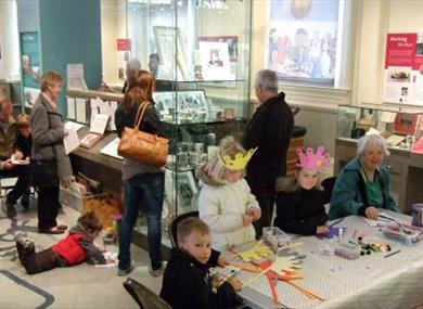 Visitors enjoying activities at the Museum