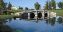 Clubhouse with bridge in foreground