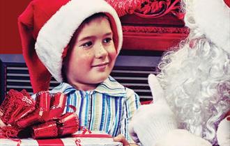 Christmas Grotto at Daniel of Windsor - young boy meets Santa